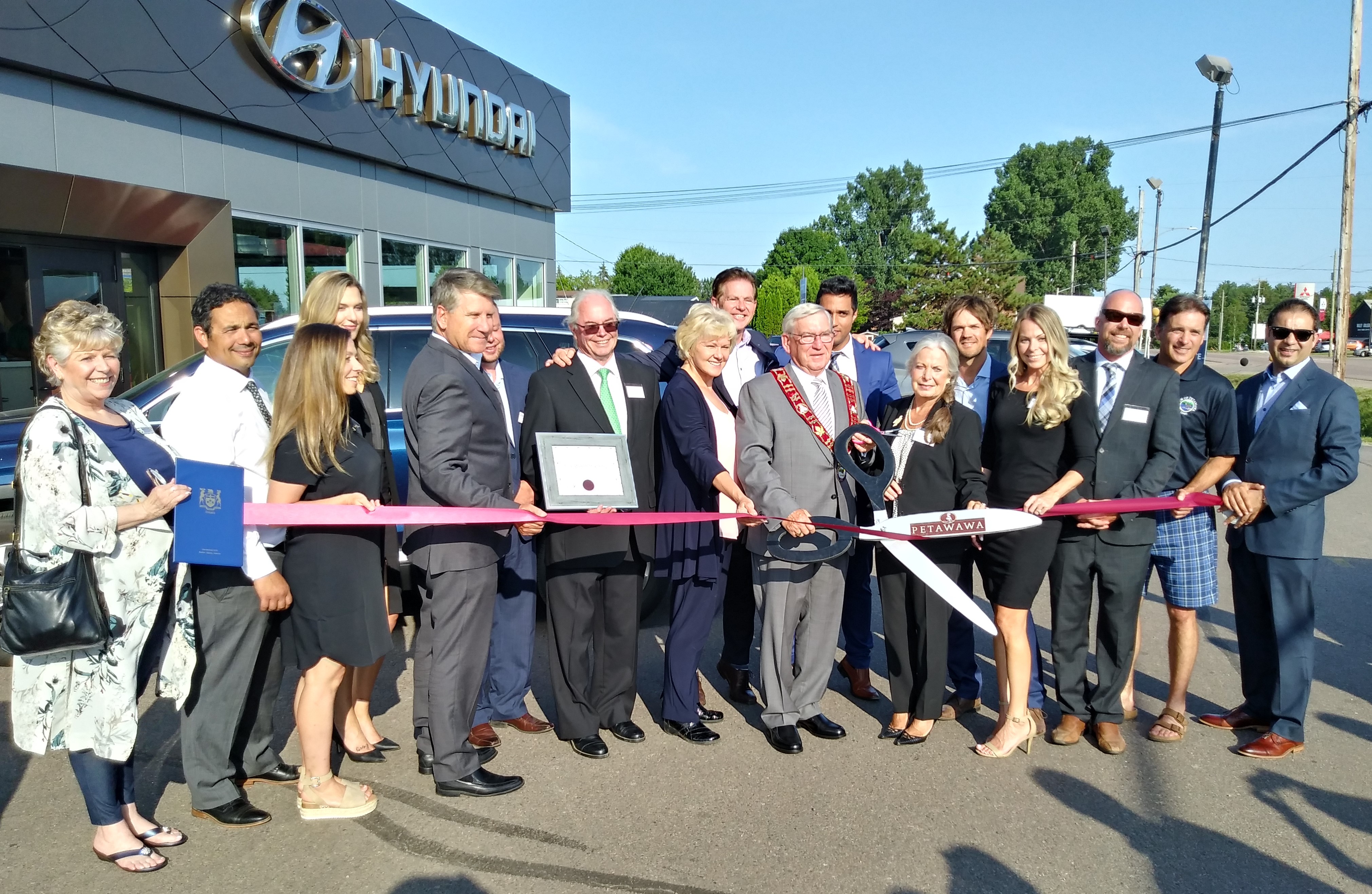 A group of individuals infront of Hyundai Pembroke location