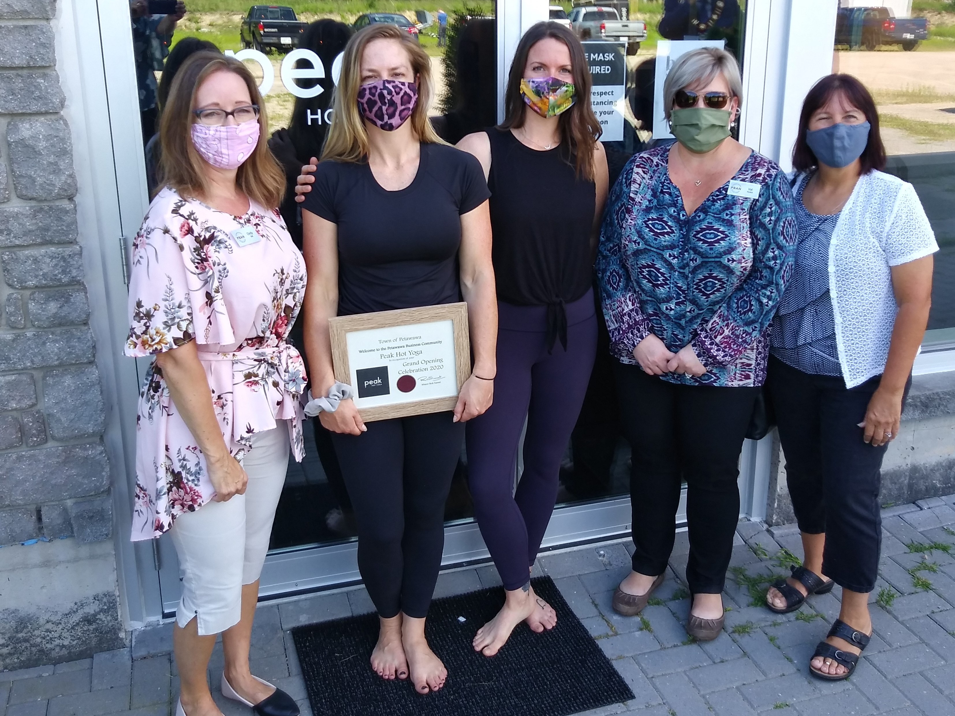 five women in an outside photo 