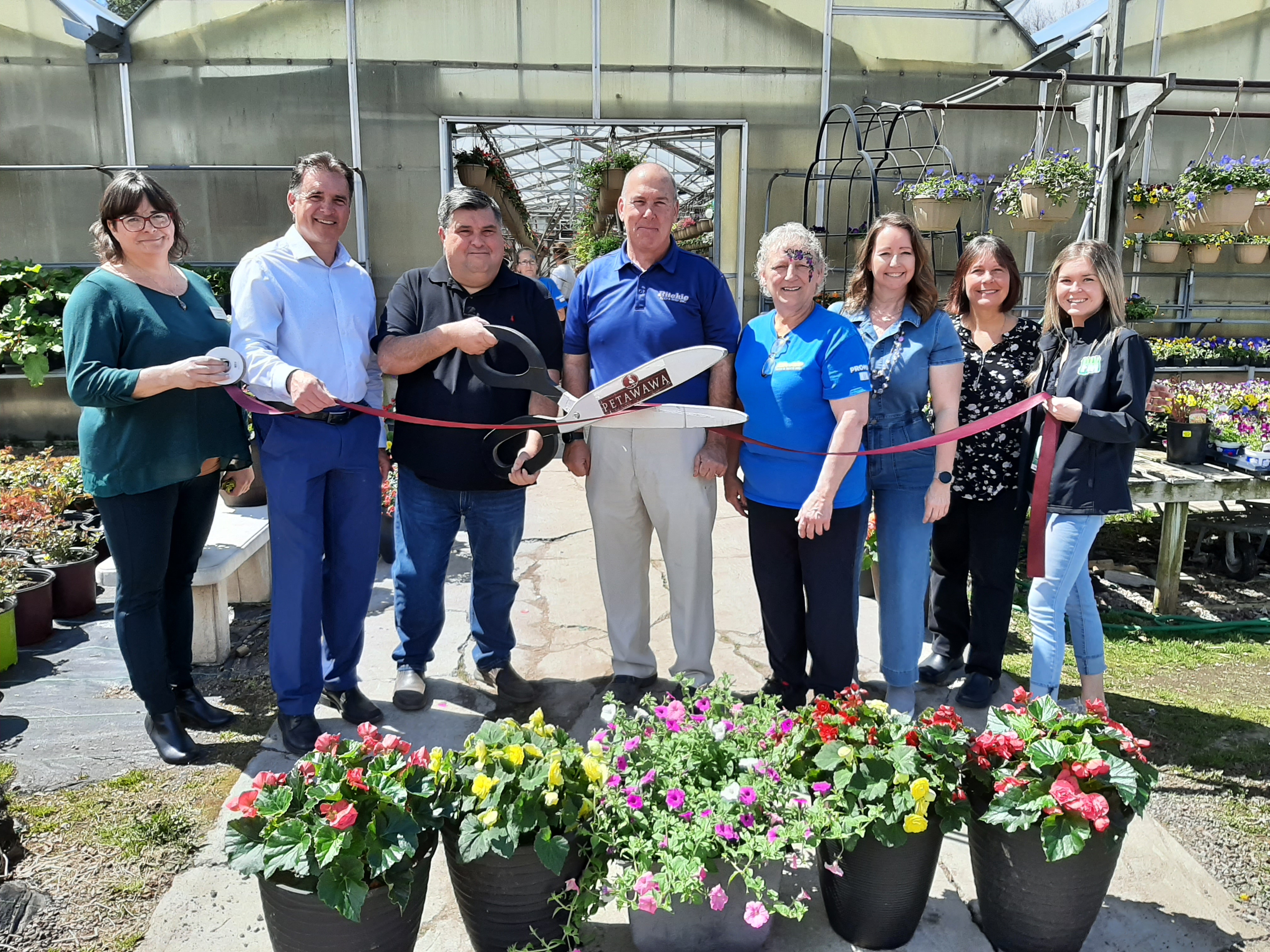 An image of the ribbon cutting ceremony at Richie Springhill Nursery