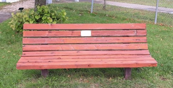 Image of bench with commemorative plaque