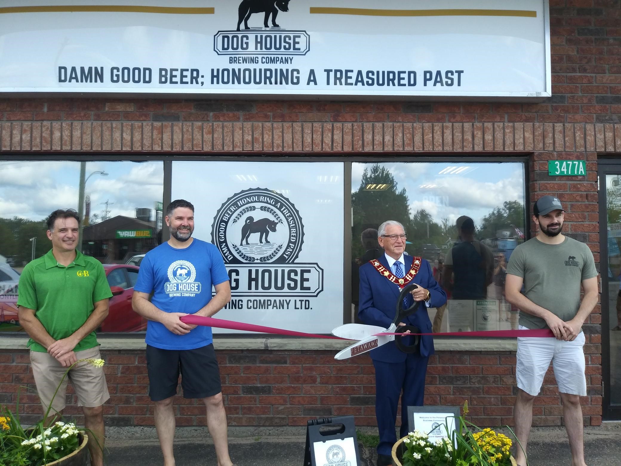 Grand Opening Ribbon cutting event with Dog House Brewing Company