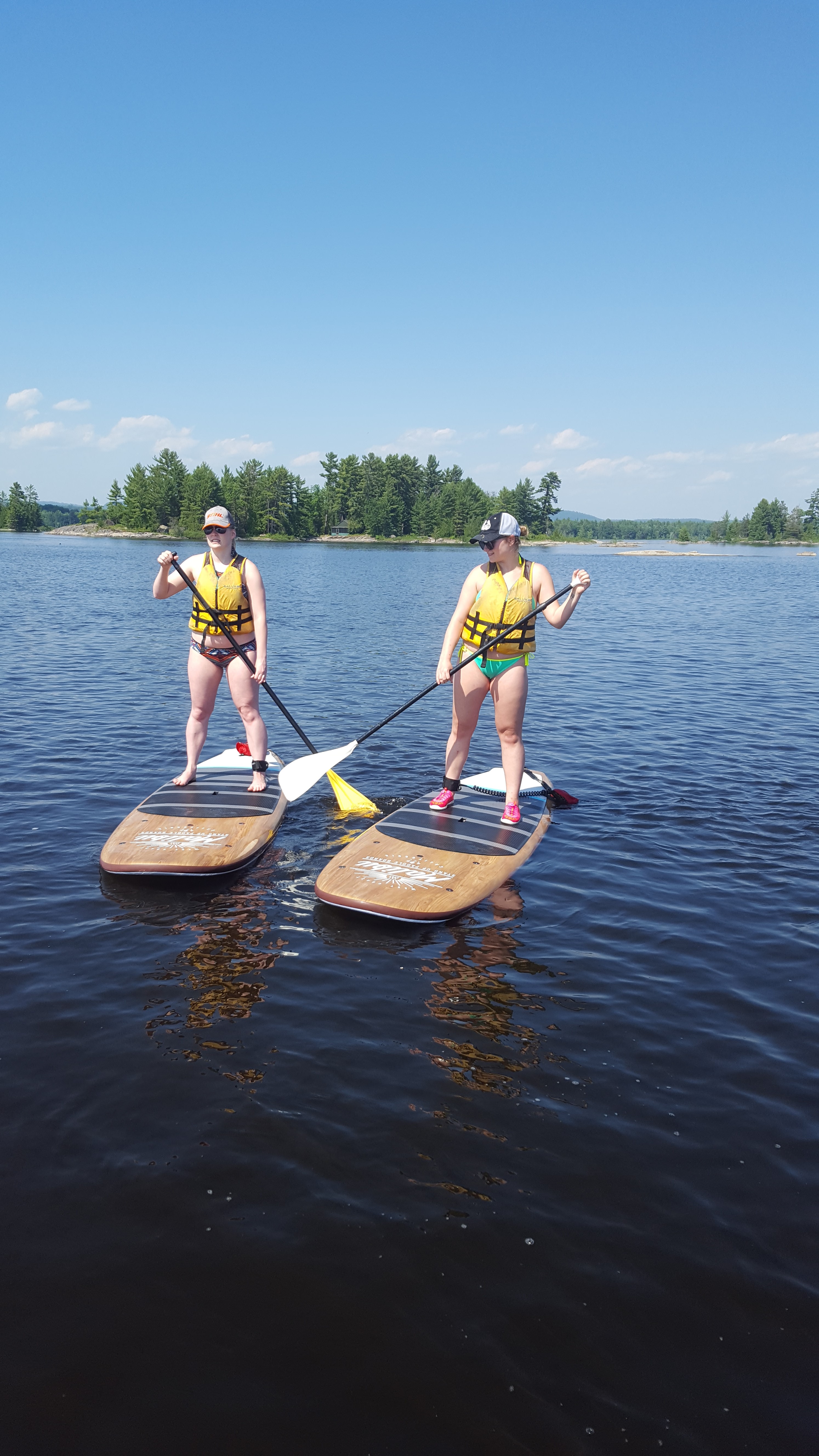 Image of 2 women on SUP boards on the Ottawa River