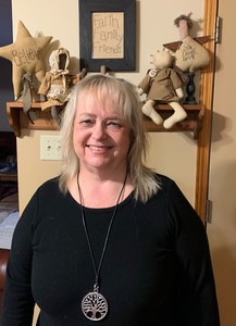 <b>Owner Cheryl Jordan in front of The Country Cupboard</b>