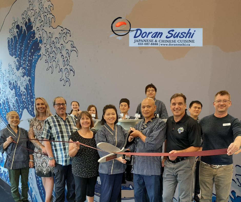 A ribbon cutting ceremony for Doran Sushi